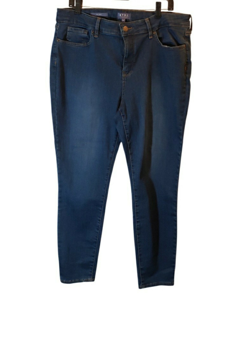 Dark wash size 14 NYDJ skinny jeans featuring a classic five-pocket design.